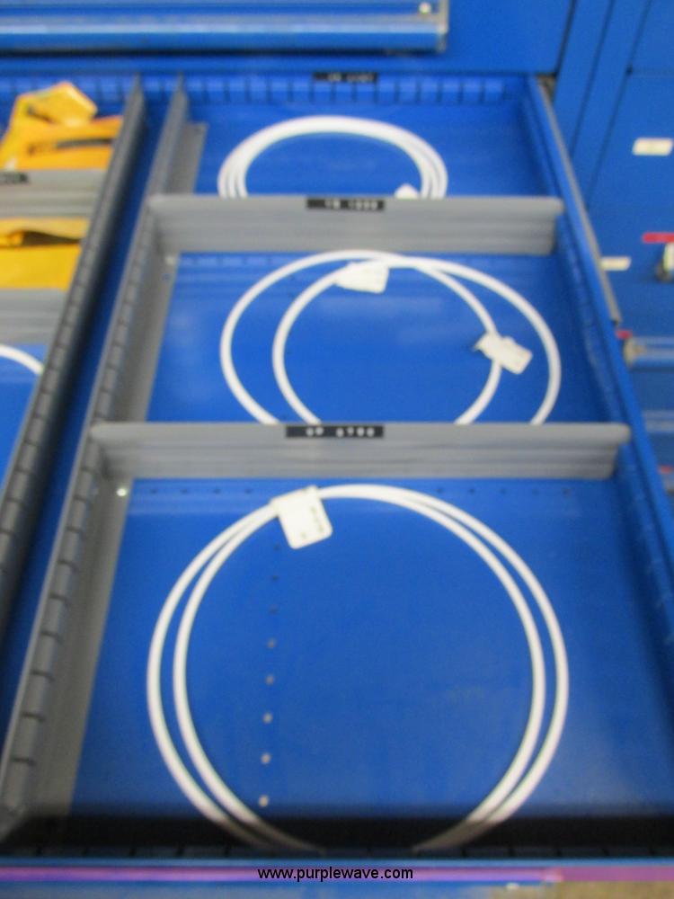 image for item V9964 Equipto parts bin and assorted Caterpillar parts