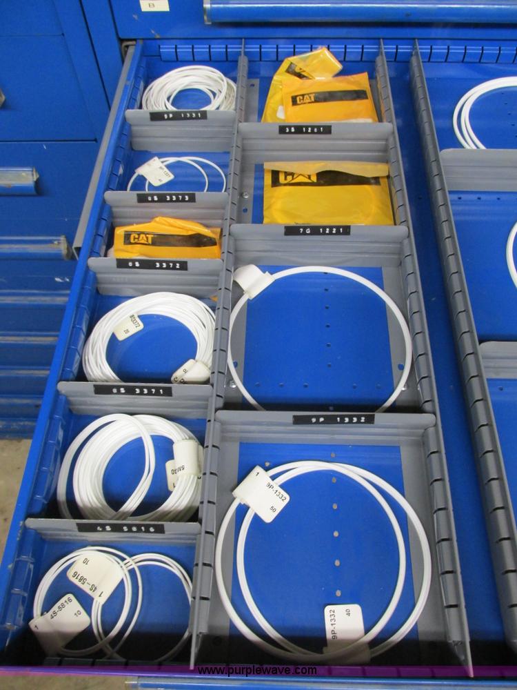 image for item V9964 Equipto parts bin and assorted Caterpillar parts