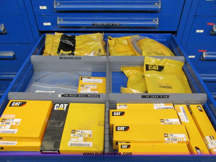 image for item V9964 Equipto parts bin and assorted Caterpillar parts