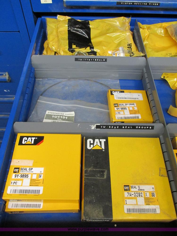 image for item V9964 Equipto parts bin and assorted Caterpillar parts