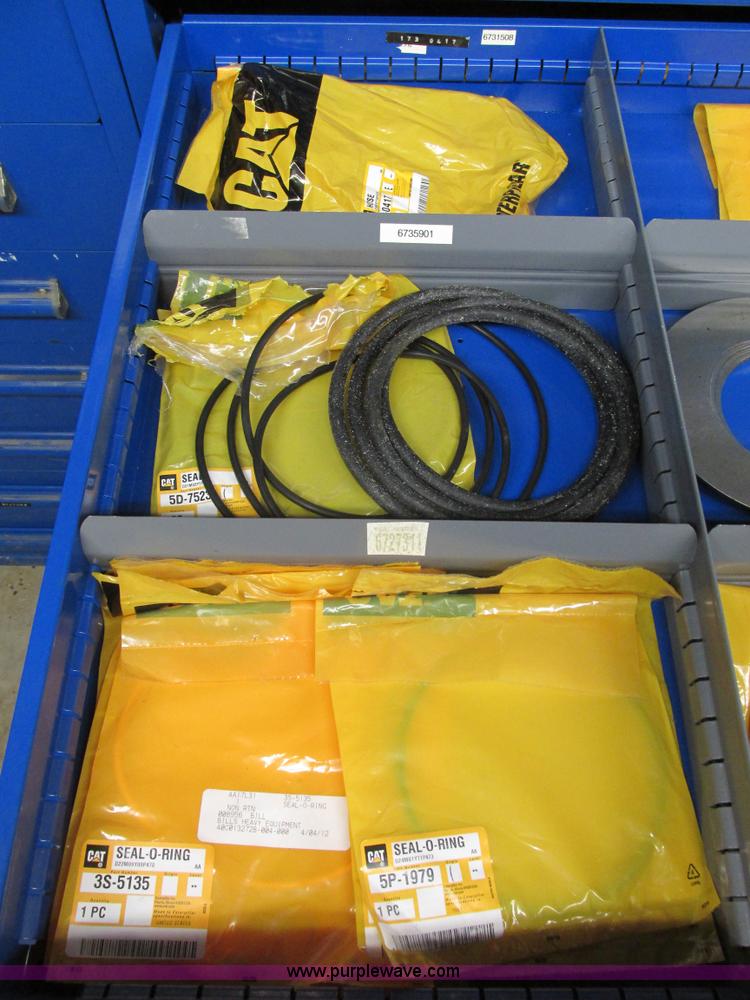 image for item V9964 Equipto parts bin and assorted Caterpillar parts