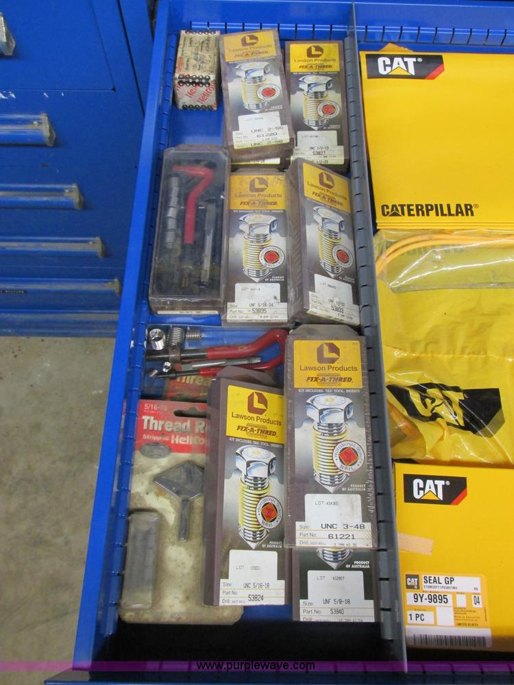 image for item V9964 Equipto parts bin and assorted Caterpillar parts