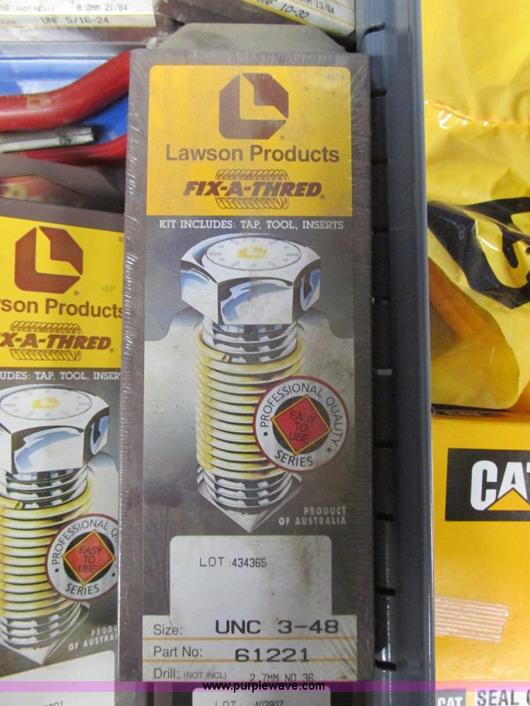 image for item V9964 Equipto parts bin and assorted Caterpillar parts