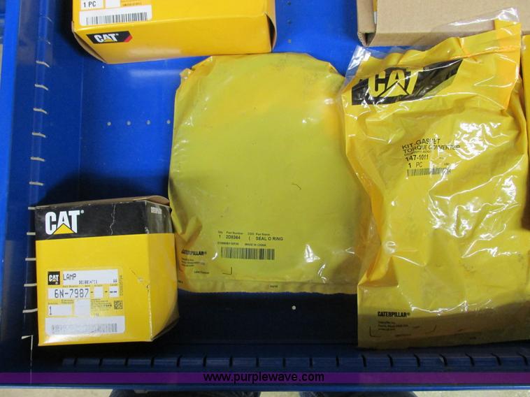 image for item V9964 Equipto parts bin and assorted Caterpillar parts