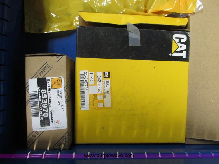 image for item V9964 Equipto parts bin and assorted Caterpillar parts