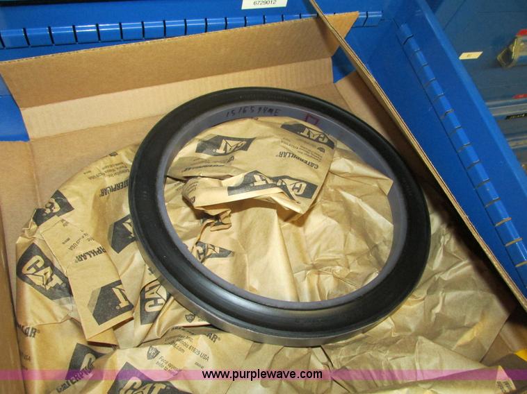 image for item V9964 Equipto parts bin and assorted Caterpillar parts