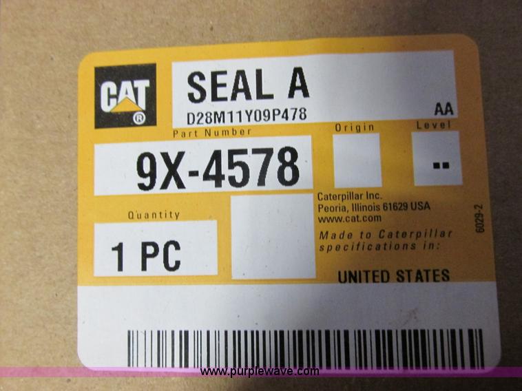 image for item V9964 Equipto parts bin and assorted Caterpillar parts