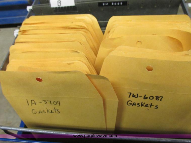 image for item V9964 Equipto parts bin and assorted Caterpillar parts