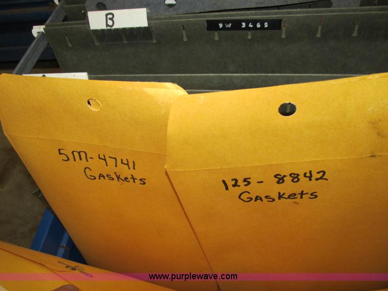 image for item V9964 Equipto parts bin and assorted Caterpillar parts