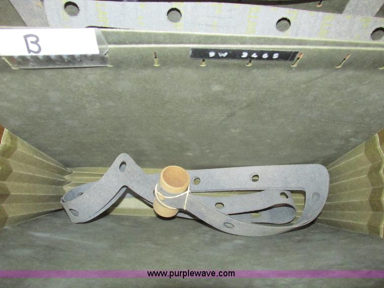 image for item V9964 Equipto parts bin and assorted Caterpillar parts