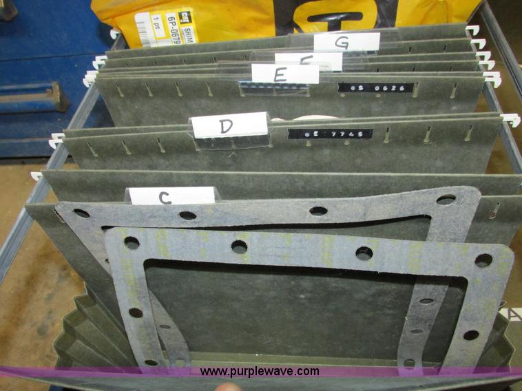 image for item V9964 Equipto parts bin and assorted Caterpillar parts