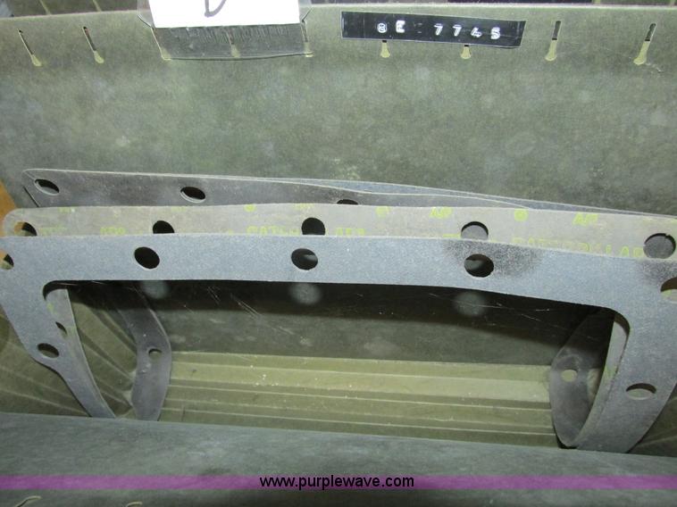 image for item V9964 Equipto parts bin and assorted Caterpillar parts