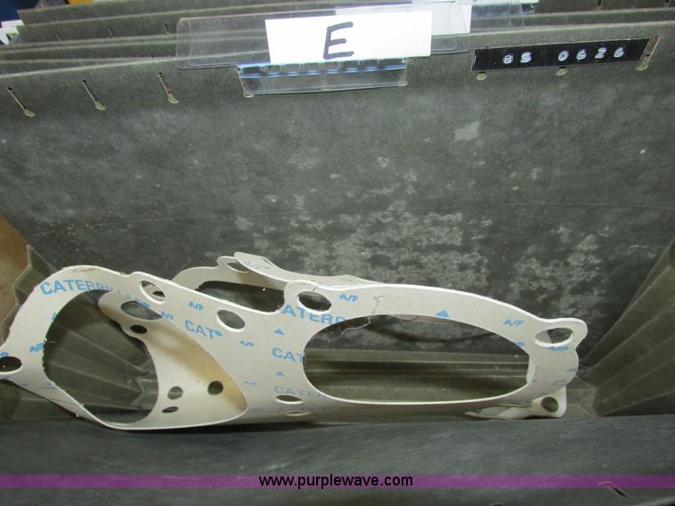 image for item V9964 Equipto parts bin and assorted Caterpillar parts