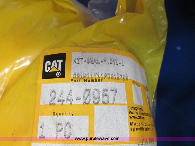 image for item V9965 Equipto parts bin and assorted Caterpillar parts