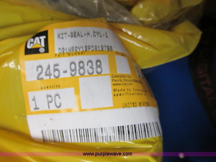 image for item V9965 Equipto parts bin and assorted Caterpillar parts