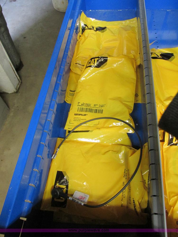 image for item V9965 Equipto parts bin and assorted Caterpillar parts