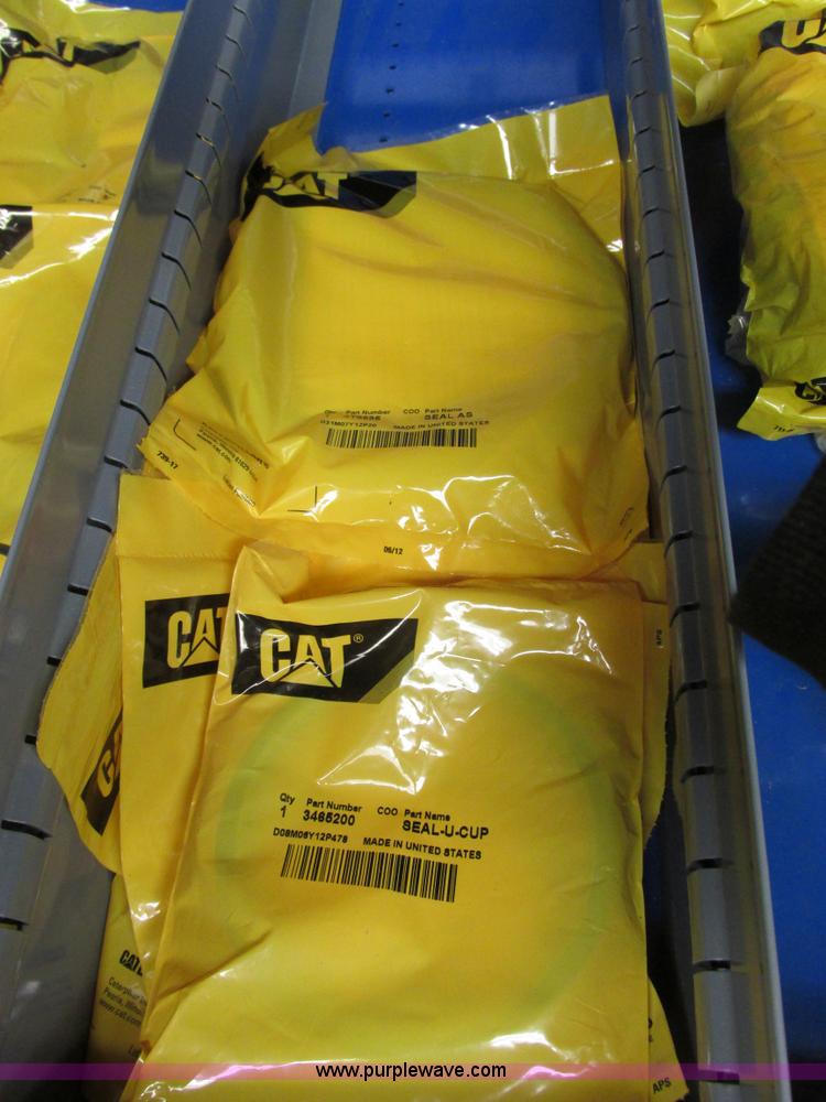image for item V9965 Equipto parts bin and assorted Caterpillar parts