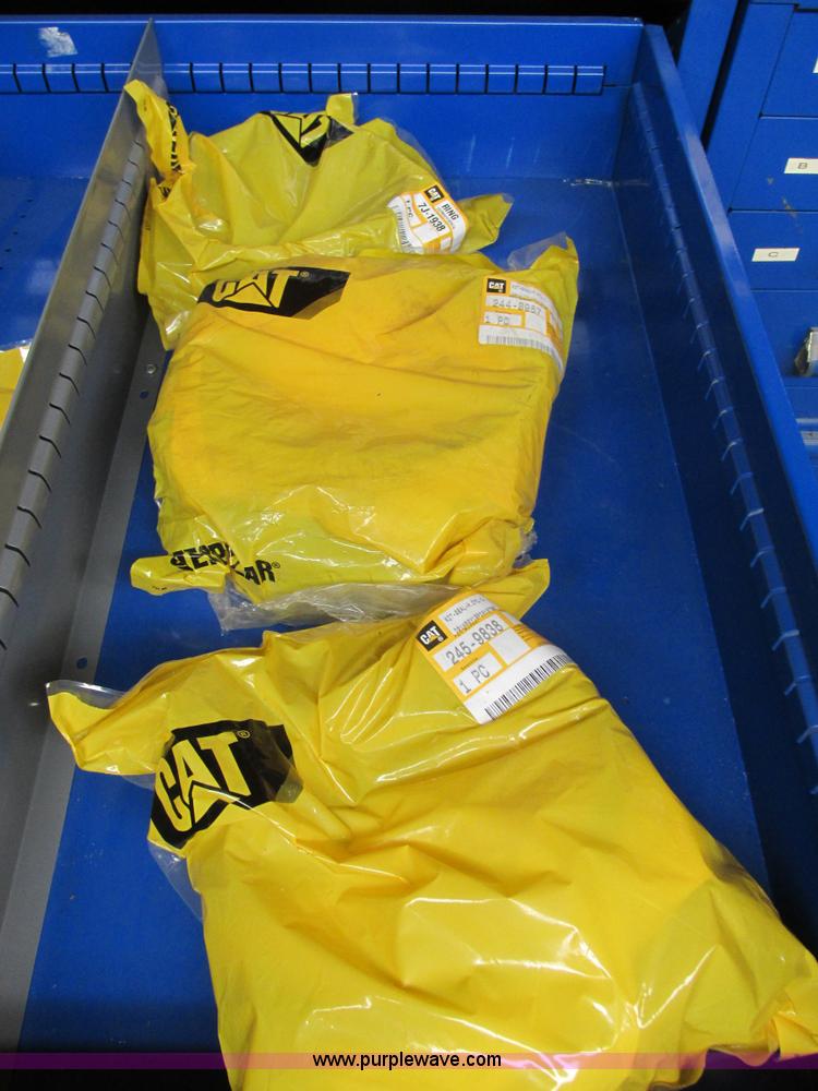 image for item V9965 Equipto parts bin and assorted Caterpillar parts