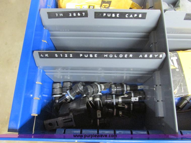 image for item V9965 Equipto parts bin and assorted Caterpillar parts