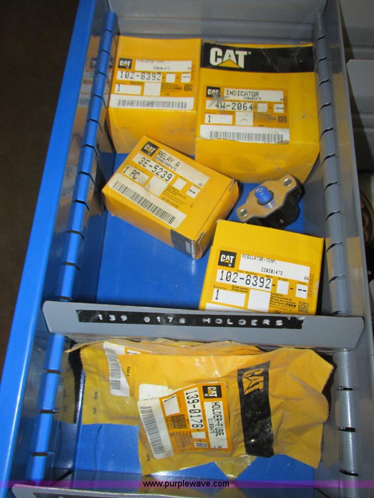 image for item V9965 Equipto parts bin and assorted Caterpillar parts