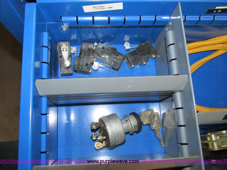 image for item V9965 Equipto parts bin and assorted Caterpillar parts