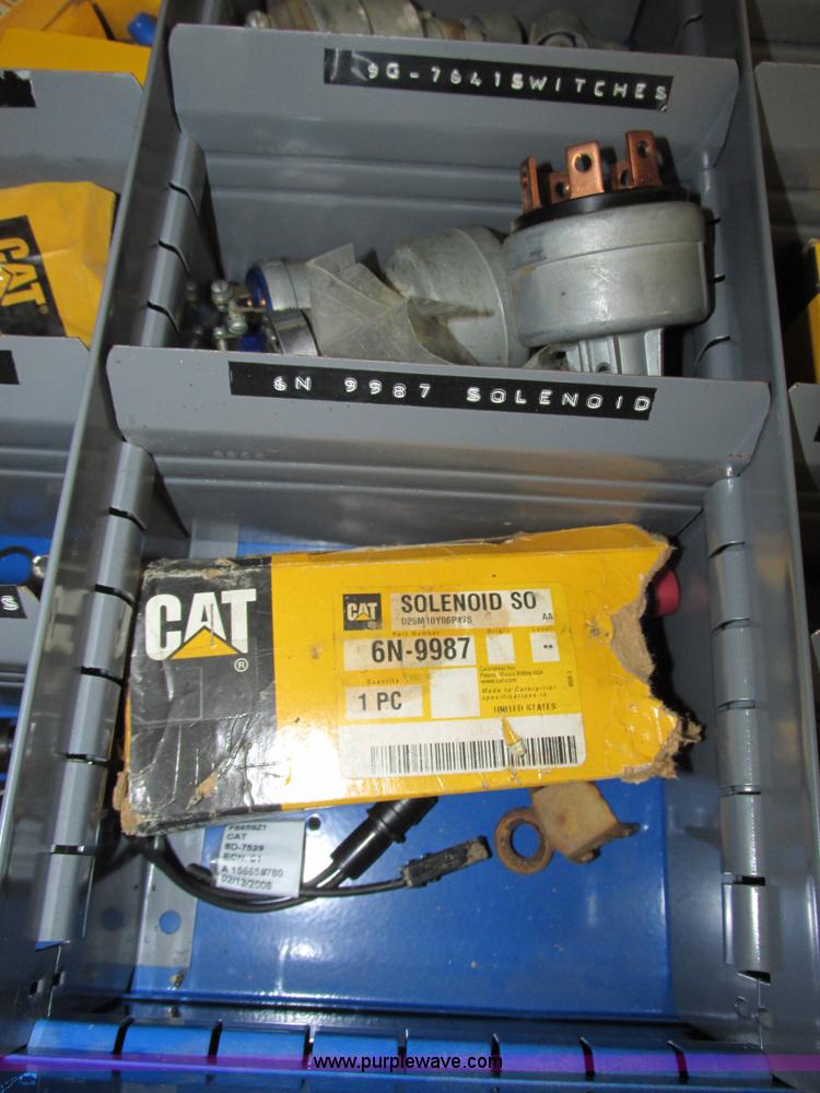 image for item V9965 Equipto parts bin and assorted Caterpillar parts