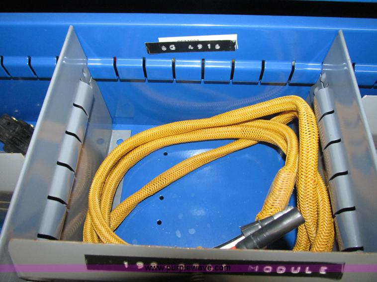 image for item V9965 Equipto parts bin and assorted Caterpillar parts