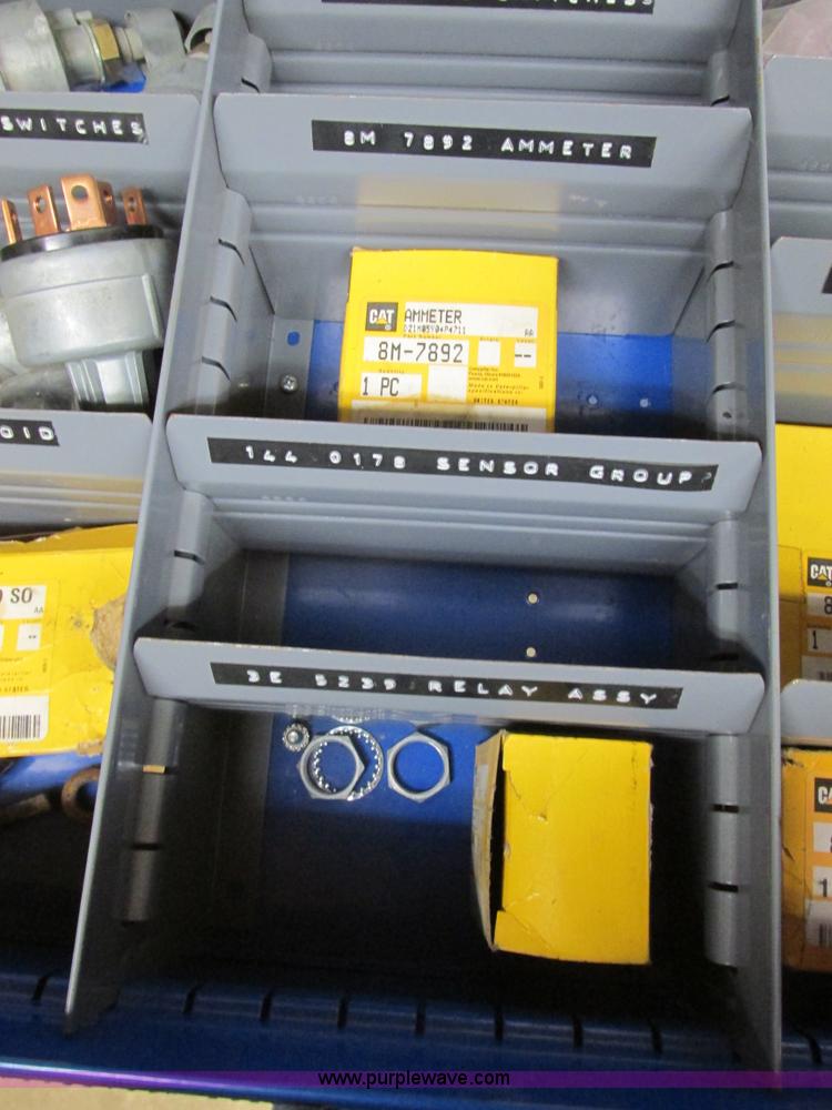 image for item V9965 Equipto parts bin and assorted Caterpillar parts