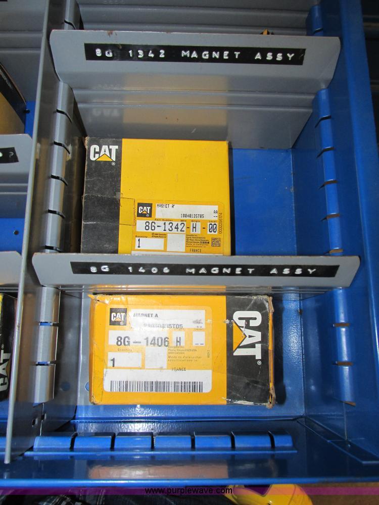 image for item V9965 Equipto parts bin and assorted Caterpillar parts