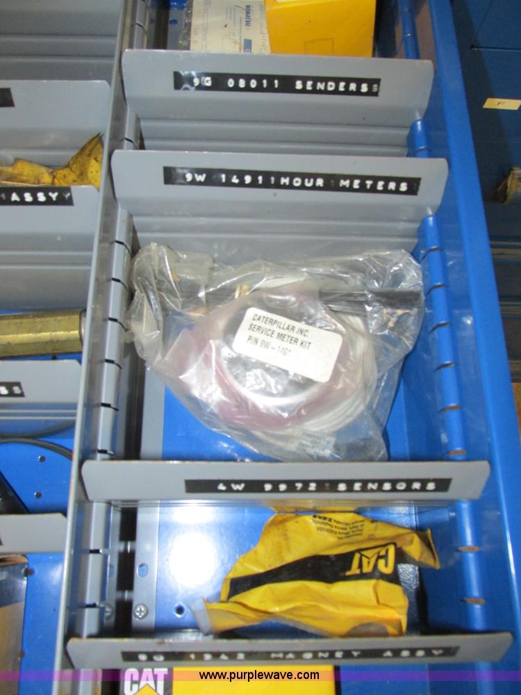 image for item V9965 Equipto parts bin and assorted Caterpillar parts