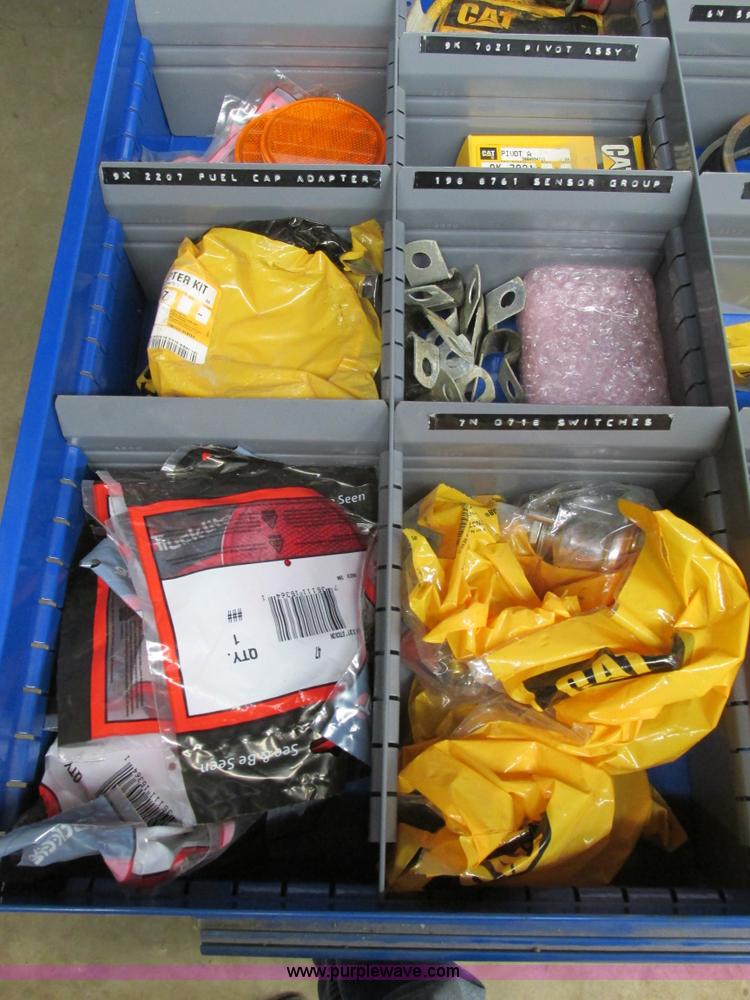 image for item V9965 Equipto parts bin and assorted Caterpillar parts