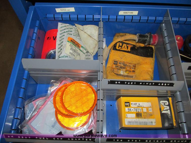 image for item V9965 Equipto parts bin and assorted Caterpillar parts