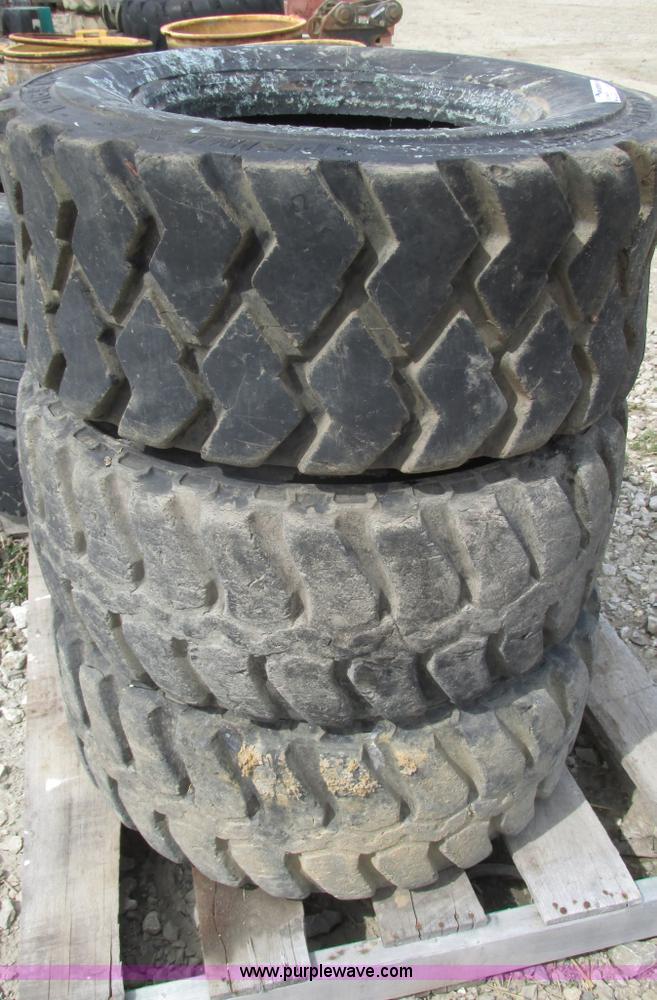 image for item V9976 (3) used 12-16.5 skid steer tires