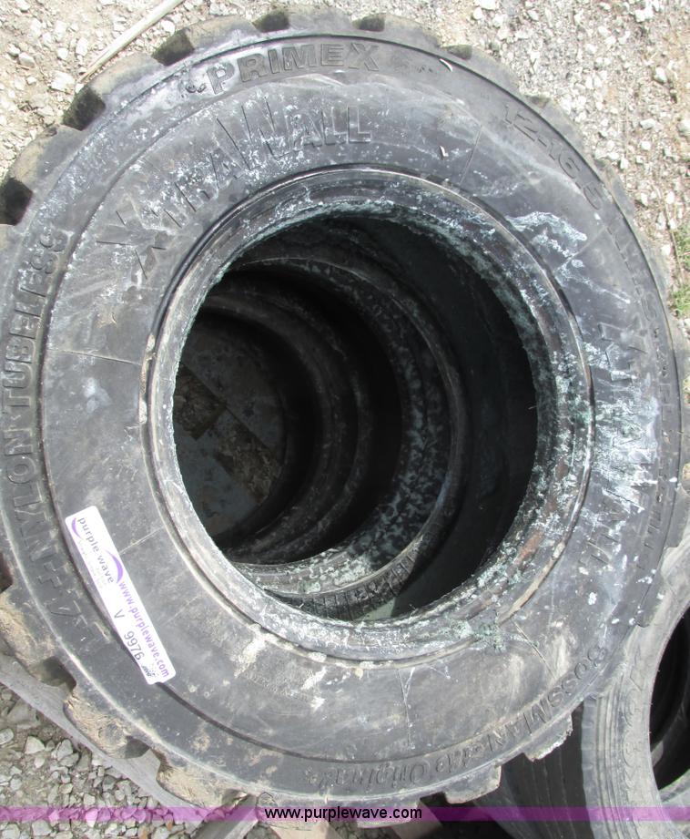 image for item V9976 (3) used 12-16.5 skid steer tires