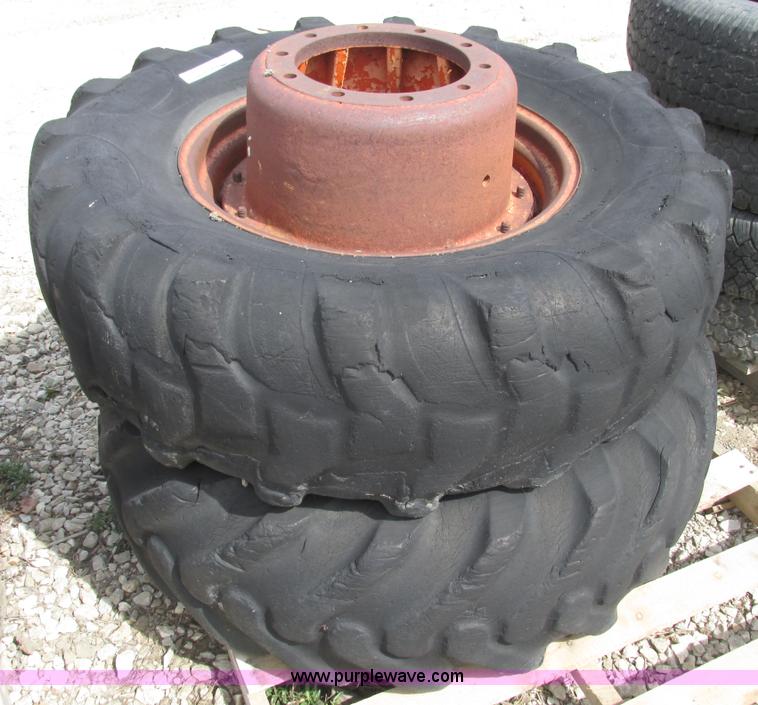 image for item V9980 (2) 14.9-24 tires and 10 bolt wheels