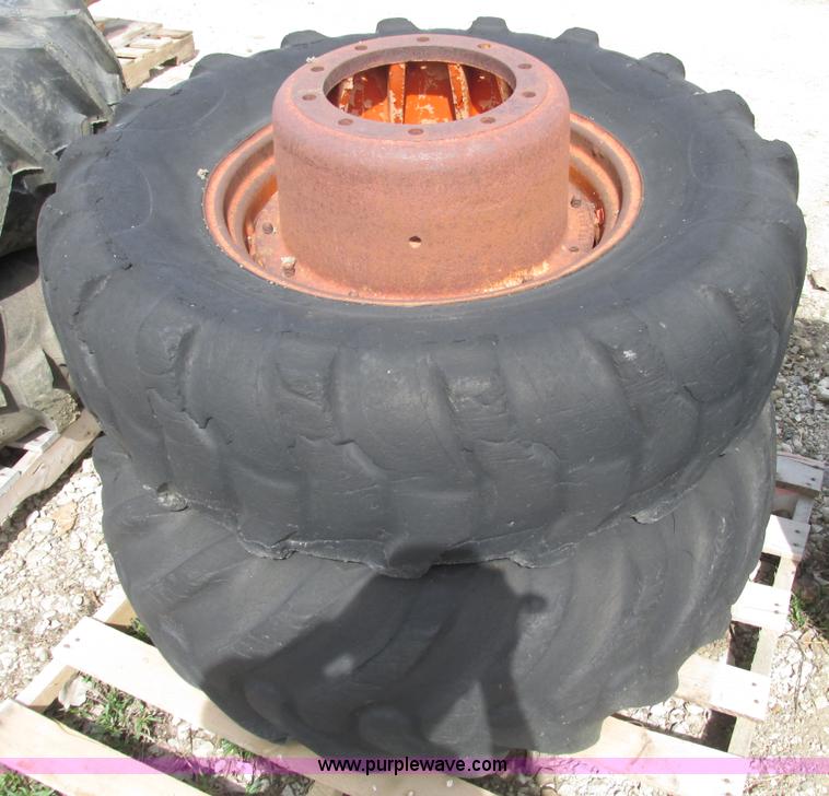 image for item V9980 (2) 14.9-24 tires and 10 bolt wheels