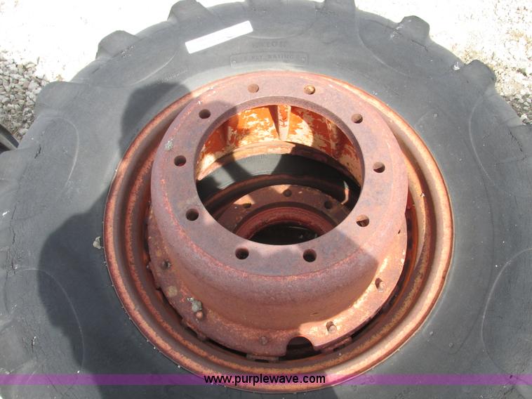 image for item V9980 (2) 14.9-24 tires and 10 bolt wheels