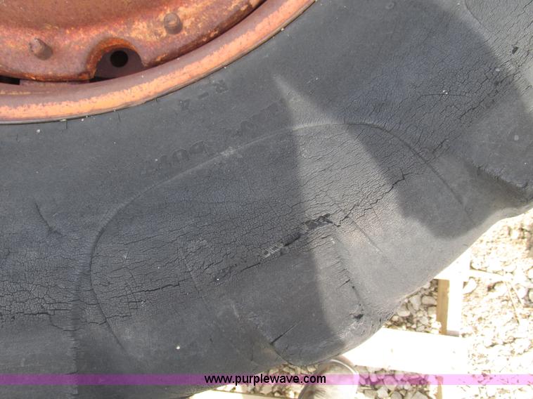 image for item V9980 (2) 14.9-24 tires and 10 bolt wheels