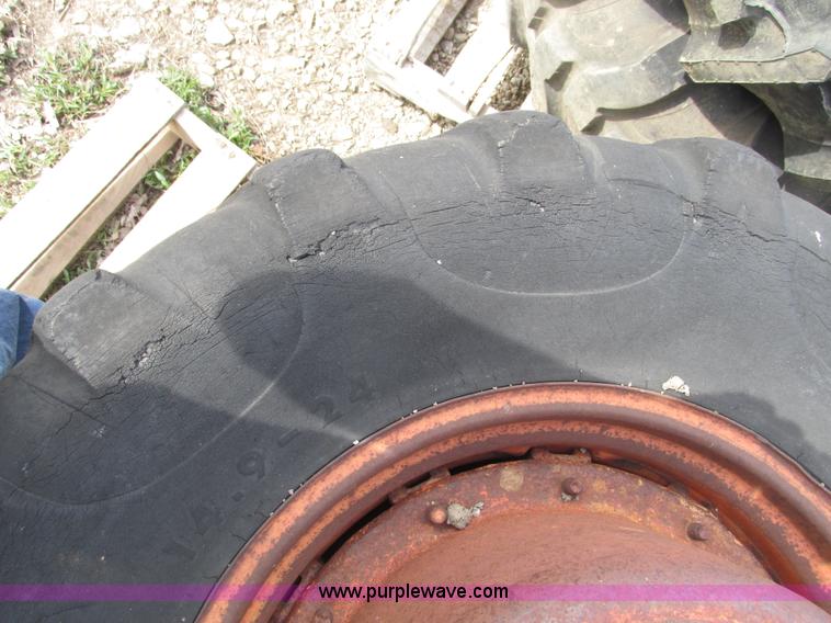 image for item V9980 (2) 14.9-24 tires and 10 bolt wheels