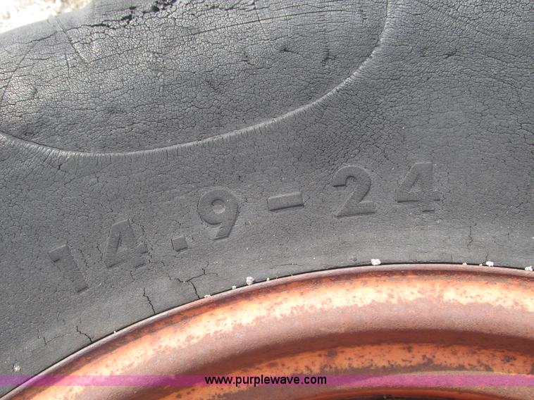 image for item V9980 (2) 14.9-24 tires and 10 bolt wheels
