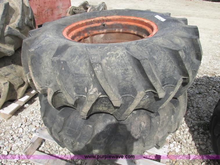 image for item V9981 (2) Firestone 14.9-24 tires and wheels