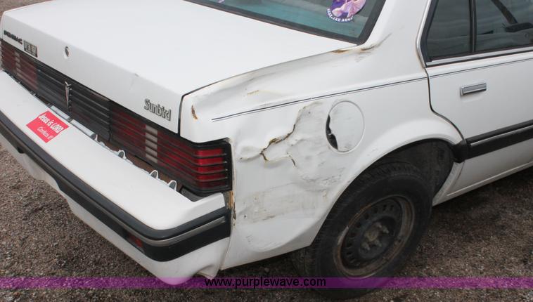 image for item E3409 1986 Pontiac Sunbird