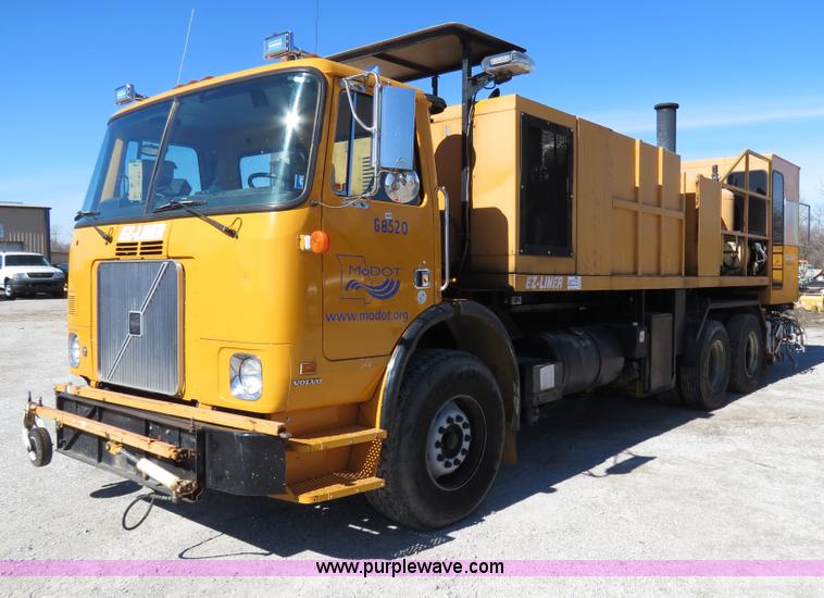 image for item B4643 1997 Volvo WX64 Ezliner paint striper truck