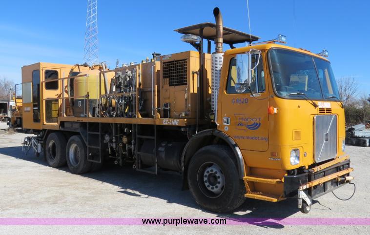 image for item B4643 1997 Volvo WX64 Ezliner paint striper truck