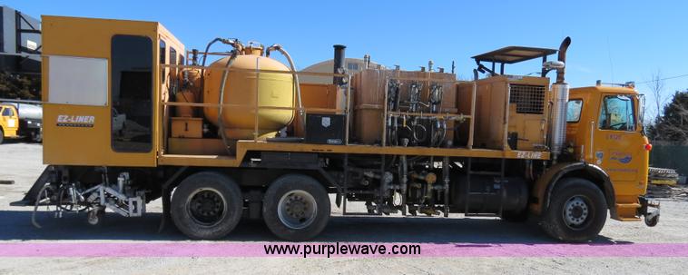 image for item B4643 1997 Volvo WX64 Ezliner paint striper truck