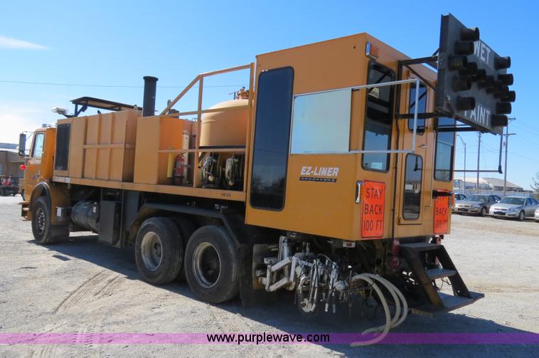 image for item B4643 1997 Volvo WX64 Ezliner paint striper truck