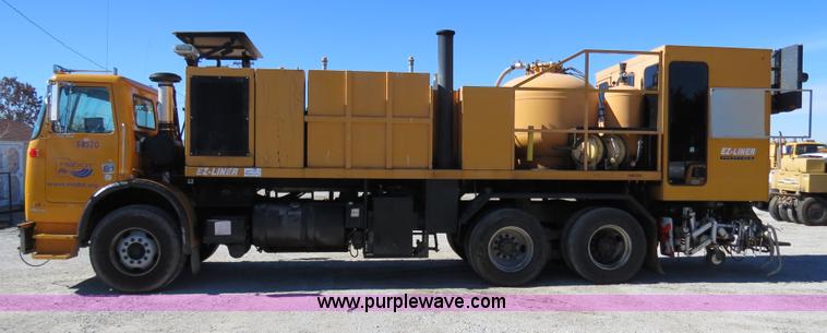 image for item B4643 1997 Volvo WX64 Ezliner paint striper truck