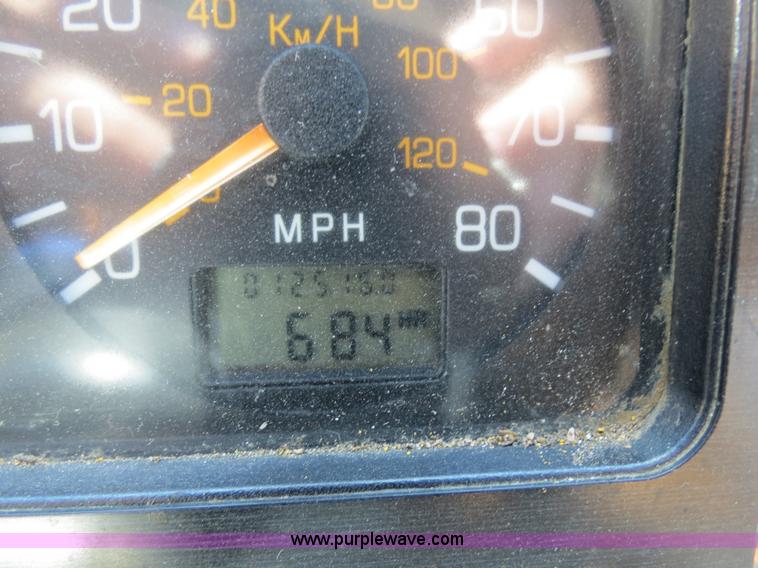 image for item B4643 1997 Volvo WX64 Ezliner paint striper truck