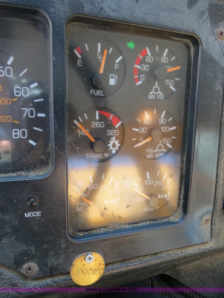 image for item B4643 1997 Volvo WX64 Ezliner paint striper truck