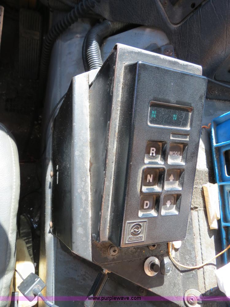 image for item B4643 1997 Volvo WX64 Ezliner paint striper truck